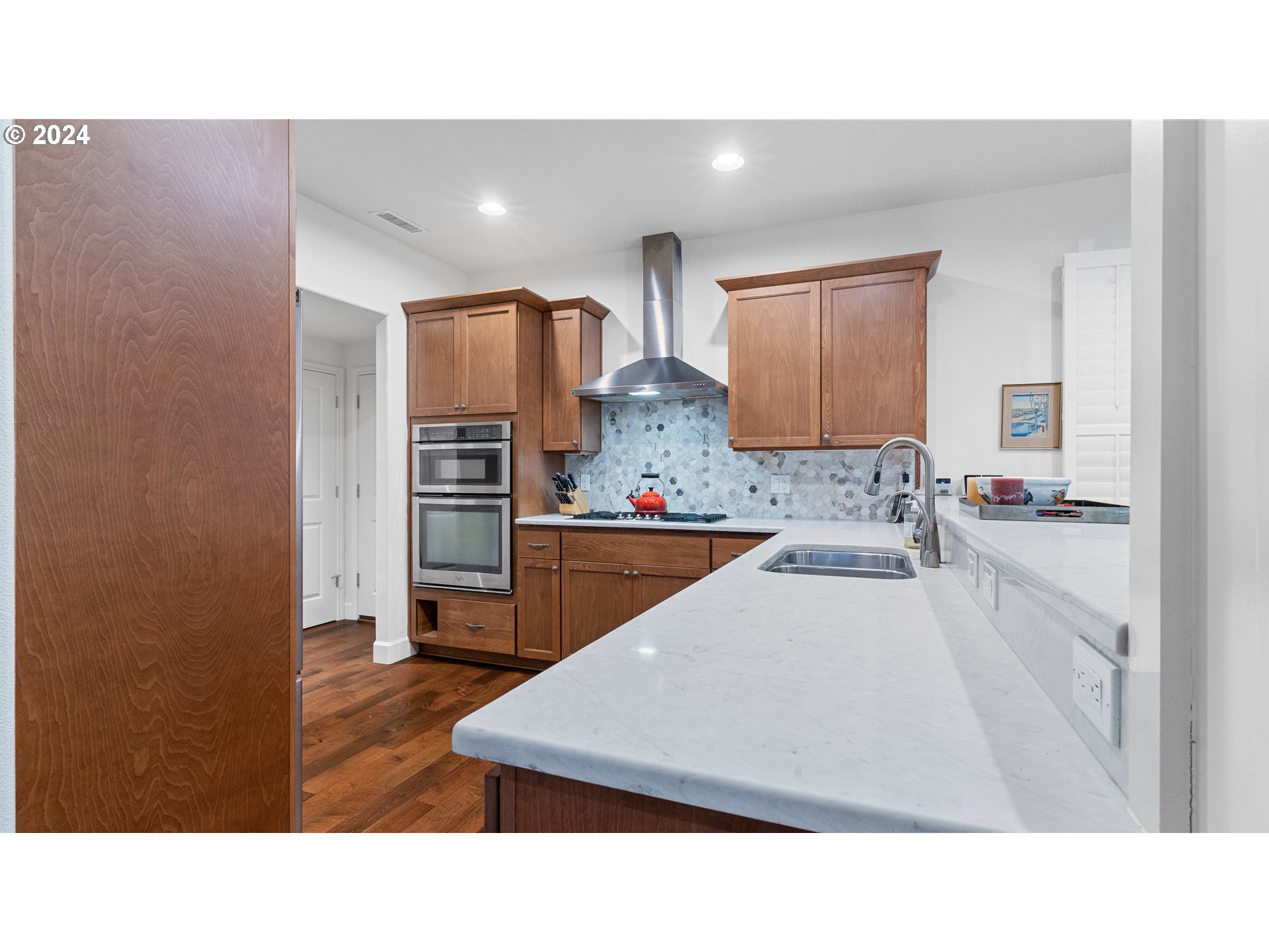 4511 Oakridge Road Lake Oswego, OR 97035 - Photo 10 of 44 a living room with stainless steel appliances kitchen island granite countertop a sink and cabinets
