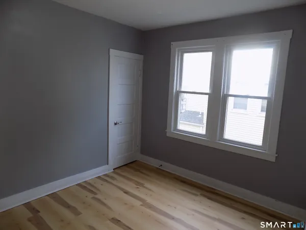 a view of a room that has a window in it