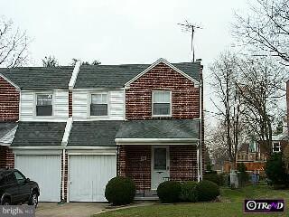 505 North Manoa Road Havertown, PA 19083 - Photo 1 of 1 a front view of a house with garden