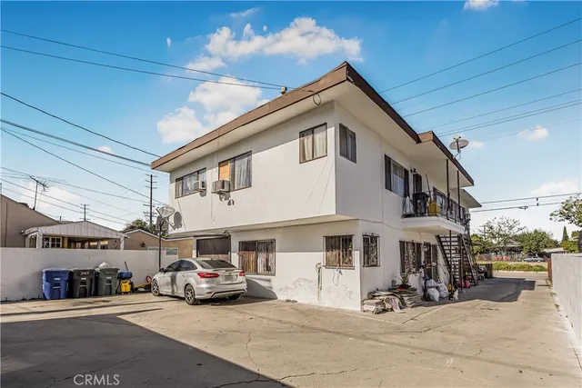 a view of a street with cars