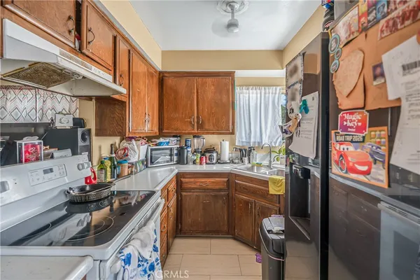 a kitchen with lots of counter top space and a sink
