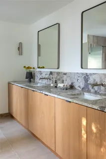 a bedroom with furniture and a couch