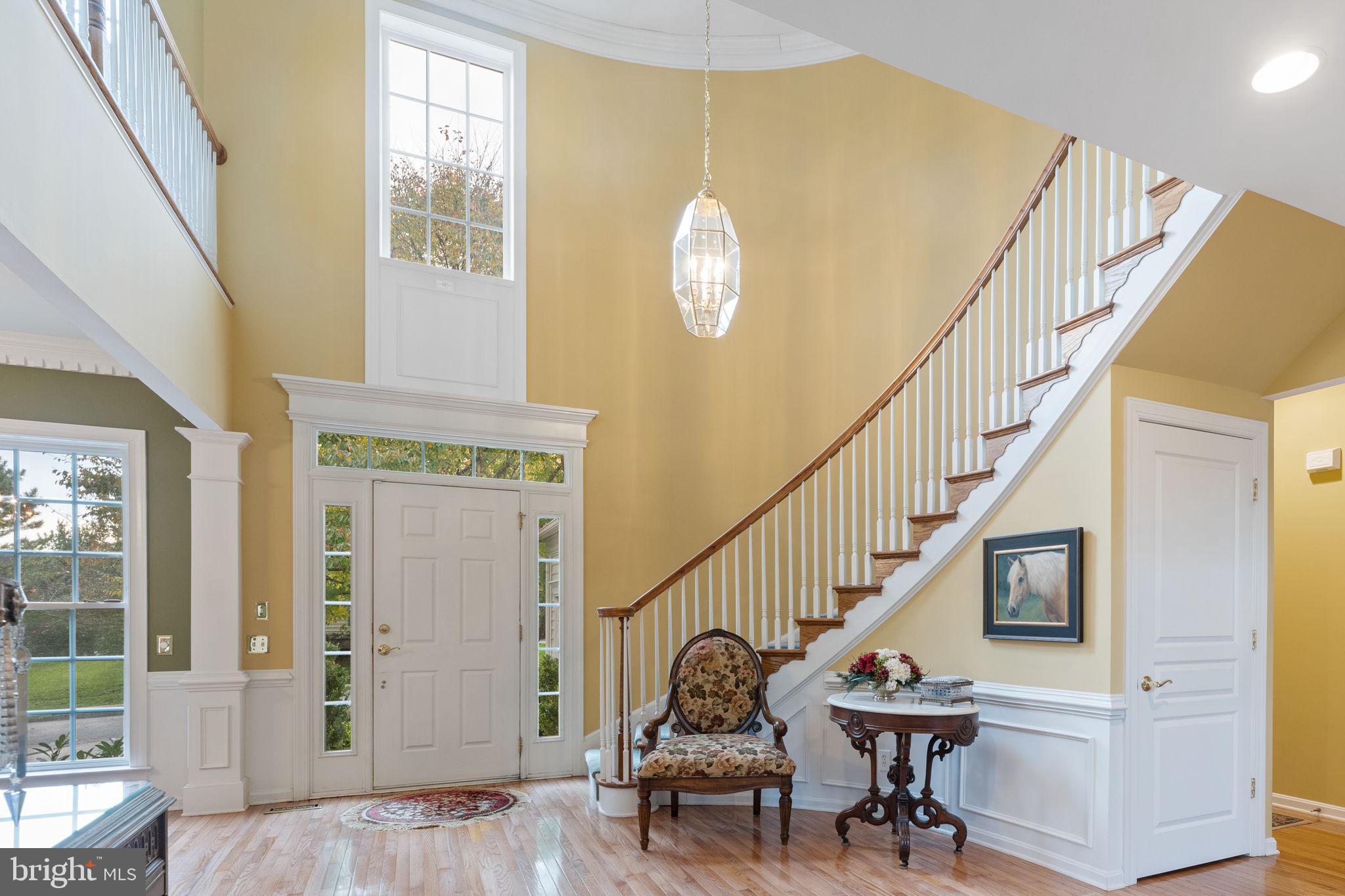 26 Ridings Way West Chester, PA 19382 - Photo 2 of 31 Dramatic Foyer with Circular Staircase