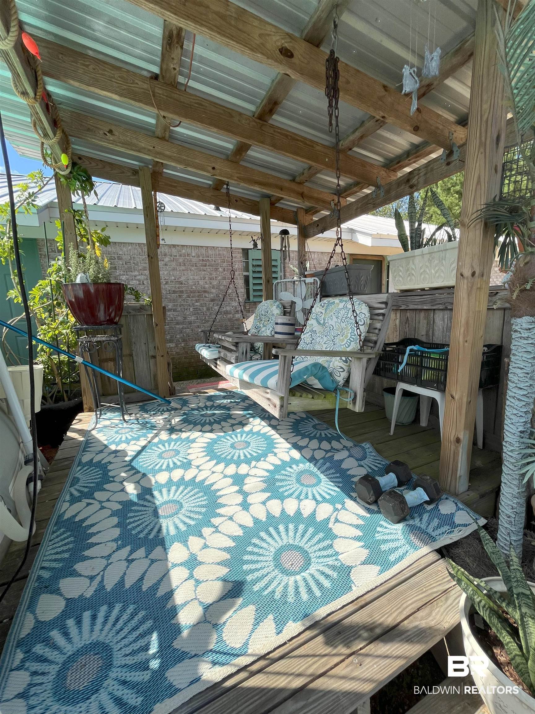 7851 Highway 98 Fairhope, AL 36532 - Photo 35 of 40 View of patio by pool with a wooden deck