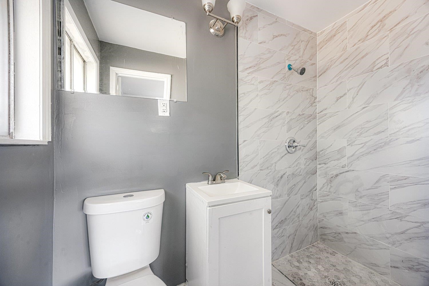 4025 Bishops Bridge Road Memphis, TN 38118 - Photo 12 of 18 a bathroom with a toilet and a sink