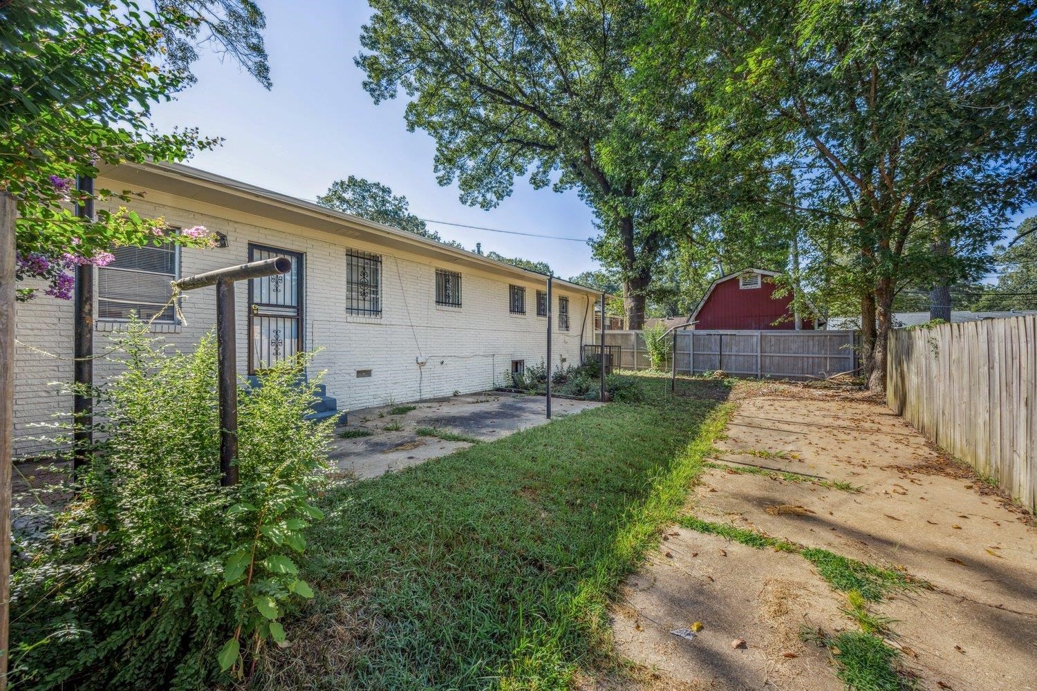 4025 Bishops Bridge Road Memphis, TN 38118 - Photo 17 of 18 a view of back yard of the house