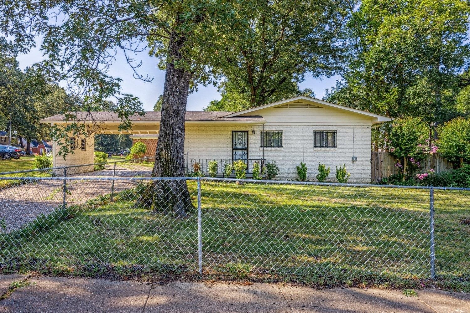 4025 Bishops Bridge Road Memphis, TN 38118 - Photo 18 of 18 a front view of a house with a yard