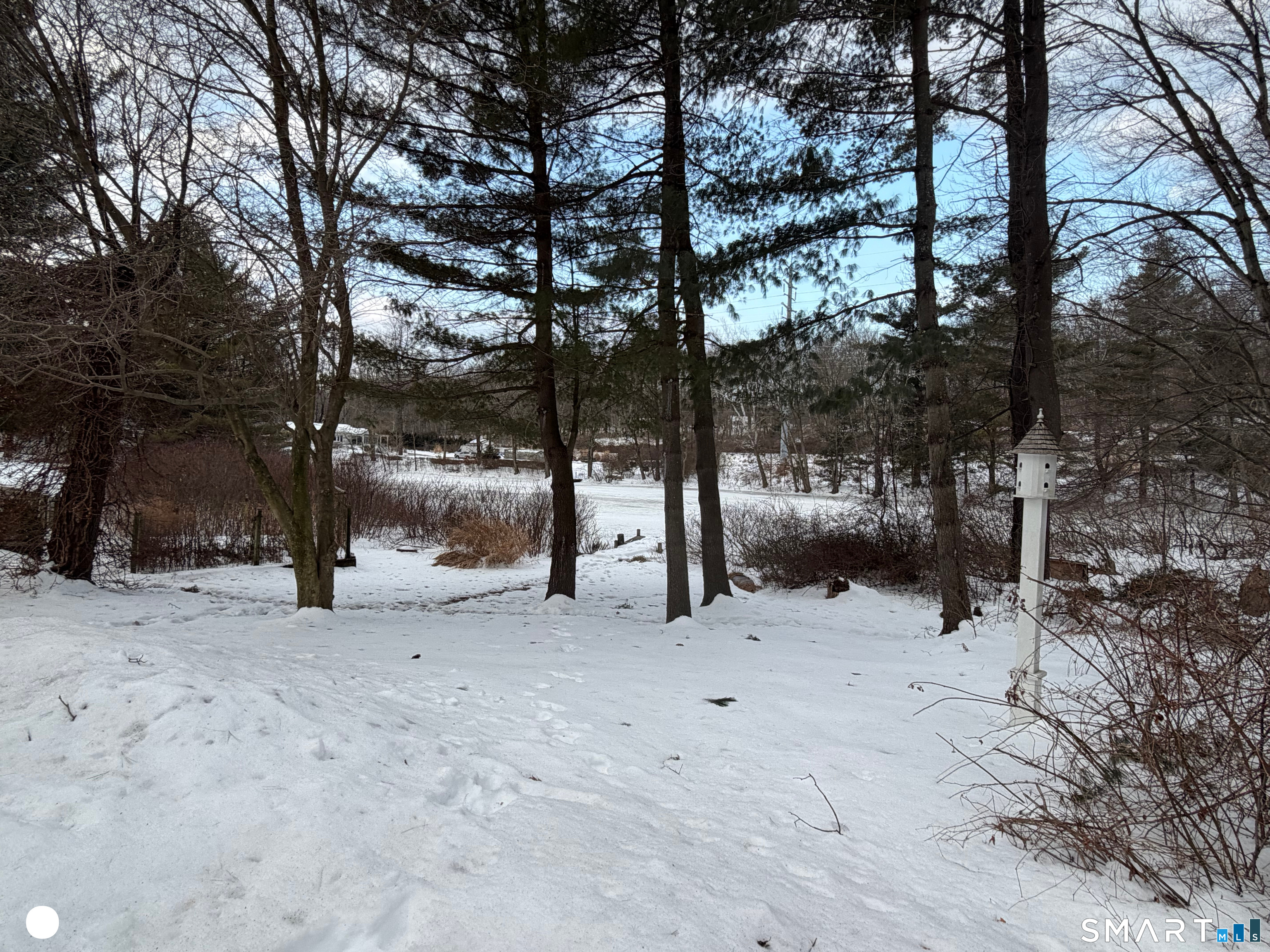 20 Arrowhead Road Wilton, CT 06897 - Photo 28 of 28 a view of water covered with snow in front of house