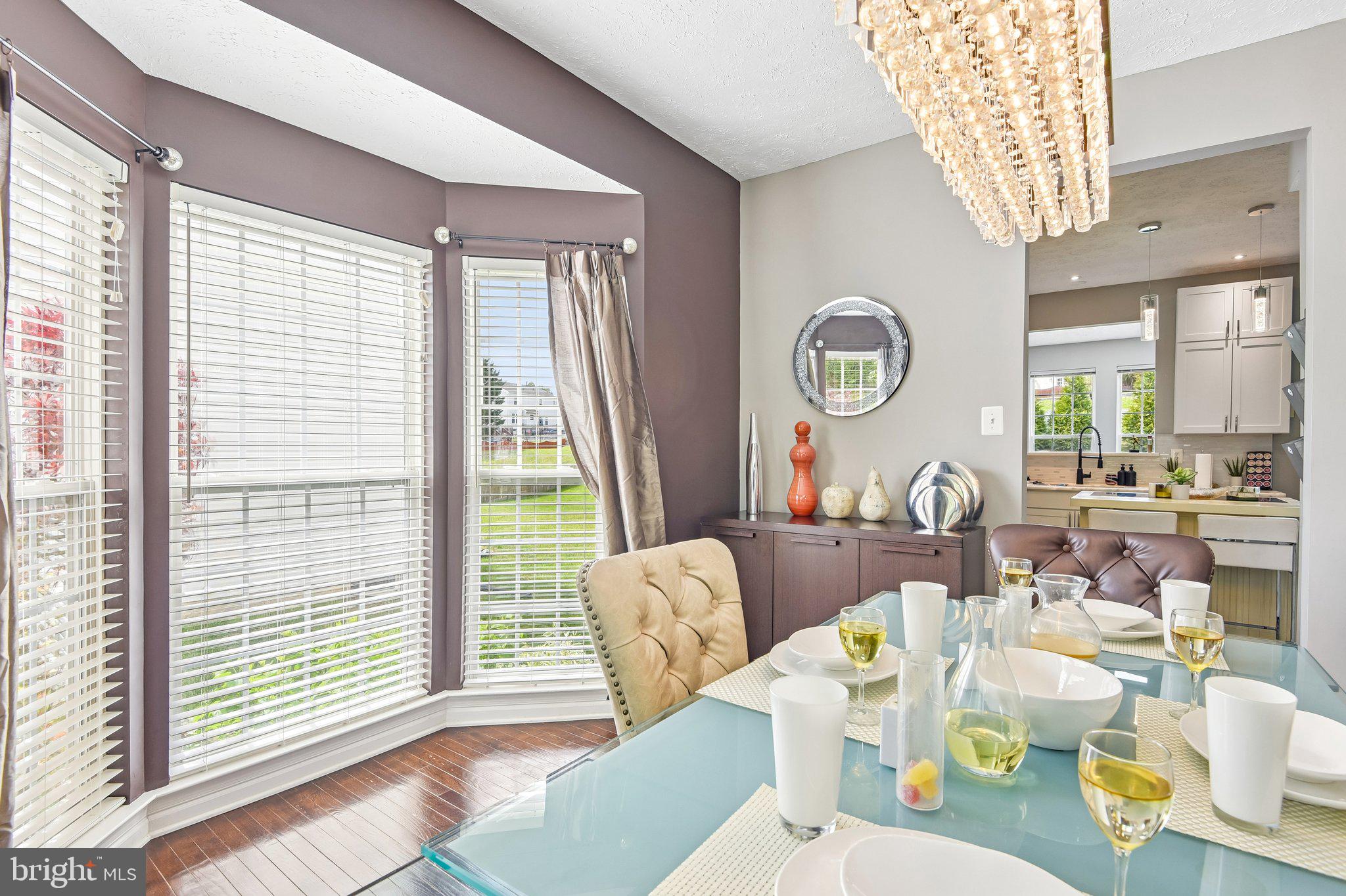 306 Watertons Way Joppa, MD 21085 - Photo 19 of 50 a view of a dining room with furniture window and outside view