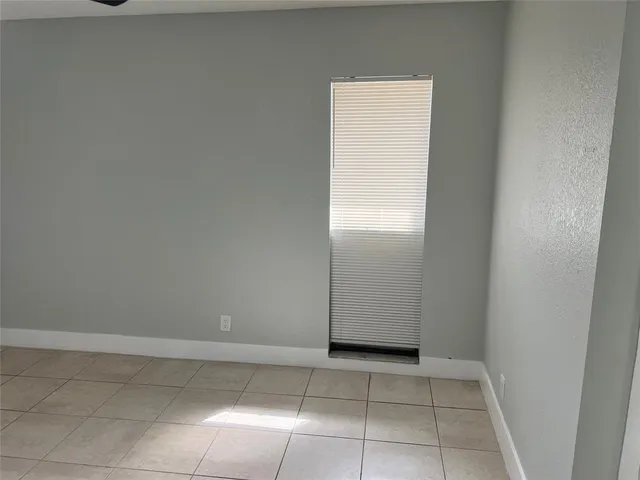 a bathroom with a sink and vanity