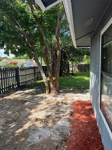 a front view of a house with a patio