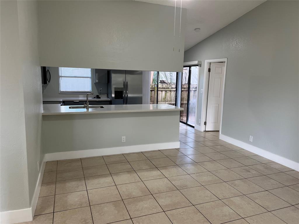 500 Northeast 34th Street Pompano Beach, FL 33064 - Photo 9 of 29 a view of a kitchen with microwave and cabinets