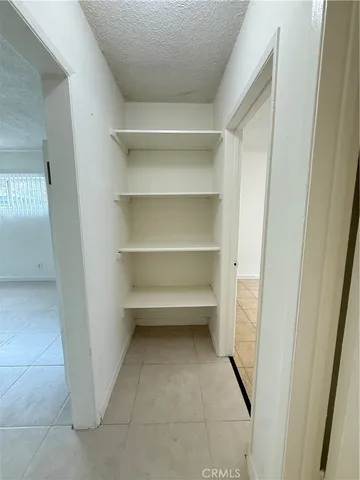 a storage room with washer and dryer