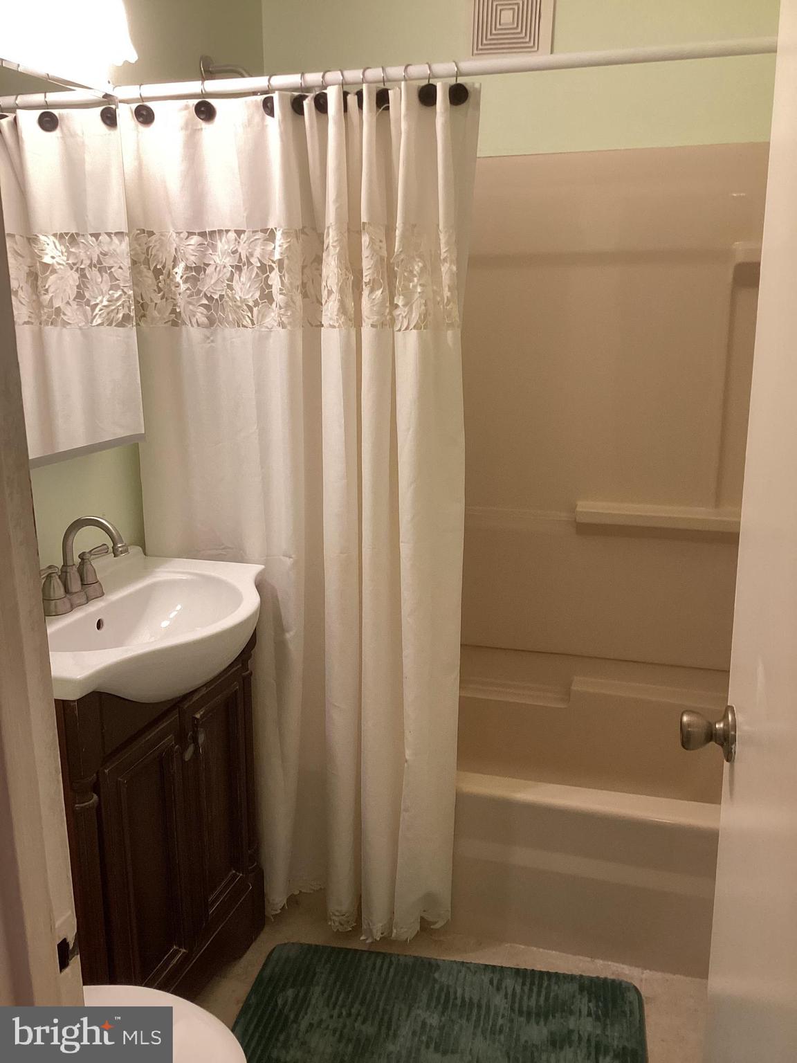 606 Fairhill Road Morrisville, PA 19067 - Photo 13 of 36 a bathroom with a sink and mirror