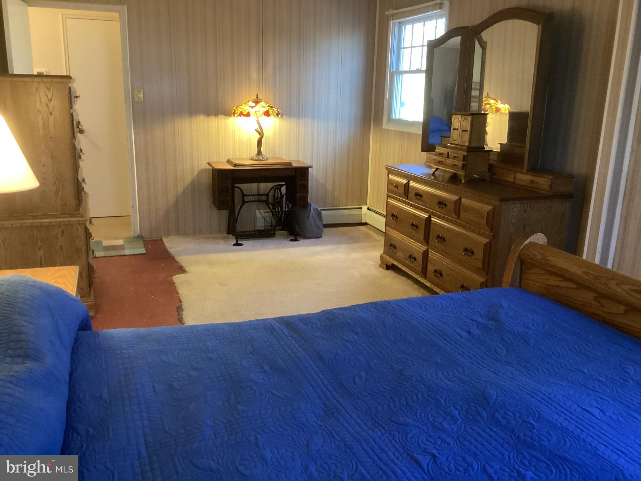 606 Fairhill Road Morrisville, PA 19067 - Photo 16 of 36 a view of kitchen with furniture and wooden floor