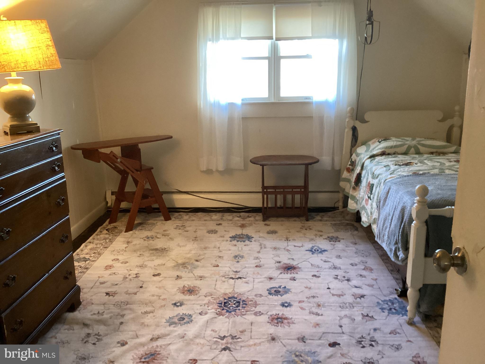 606 Fairhill Road Morrisville, PA 19067 - Photo 18 of 36 a bedroom with a bed and a window