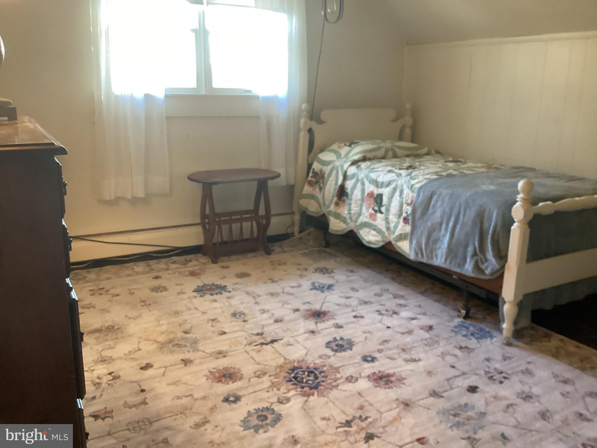 606 Fairhill Road Morrisville, PA 19067 - Photo 20 of 36 a bedroom with a bed and a window