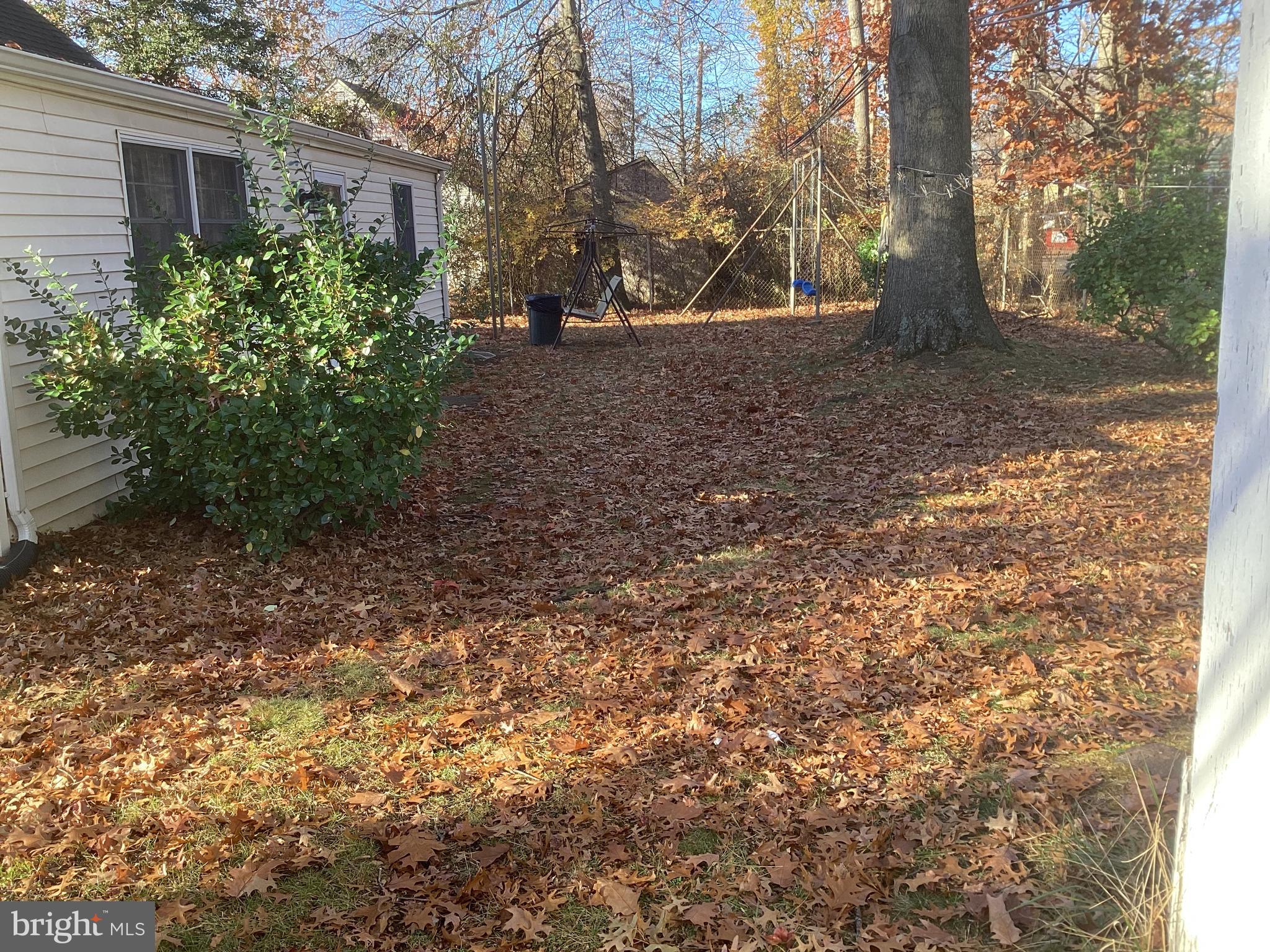 606 Fairhill Road Morrisville, PA 19067 - Photo 29 of 36 a backyard of a house with lots of green space