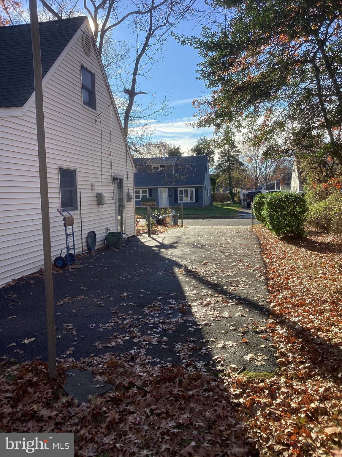 606 Fairhill Road Morrisville, PA 19067 - Photo 30 of 36 a view of a yard with a house