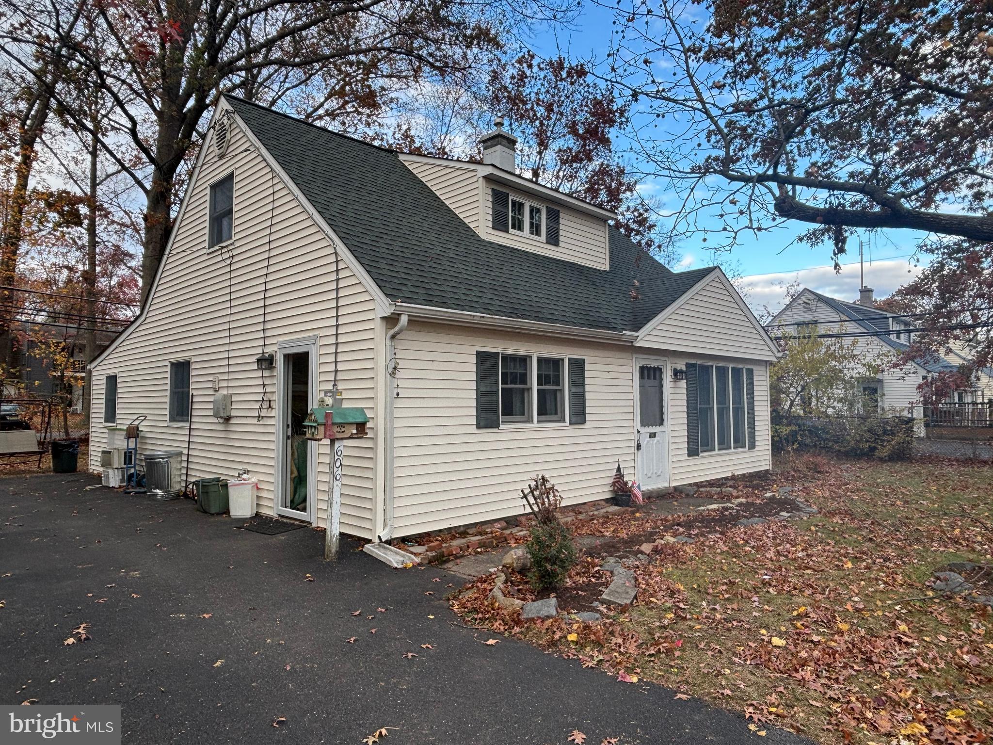 606 Fairhill Road Morrisville, PA 19067 - Photo 35 of 36 a front view of a house with a yard