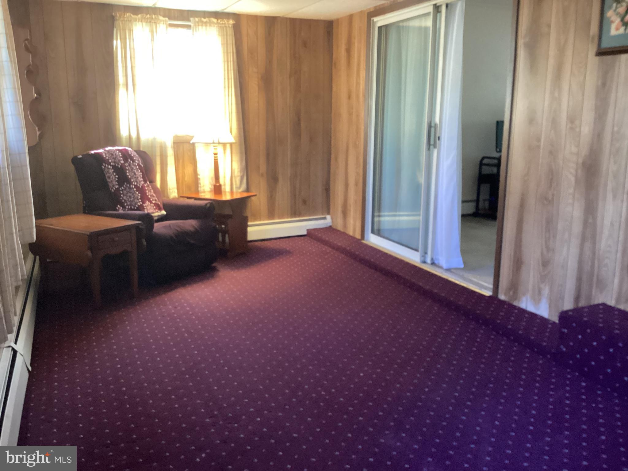 606 Fairhill Road Morrisville, PA 19067 - Photo 10 of 36 a living room with furniture and a window
