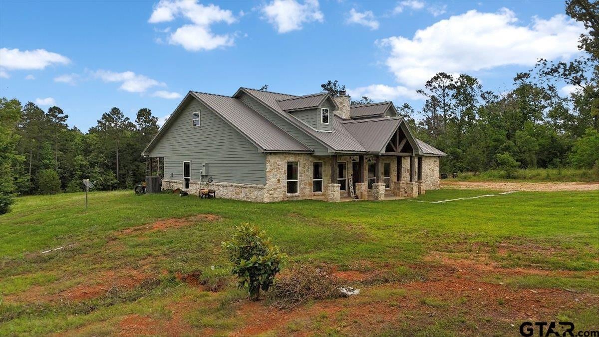 9235 Farm To Market Road 851 Rusk, TX 75785 - Photo 3 of 47 a view of a house with a big yard