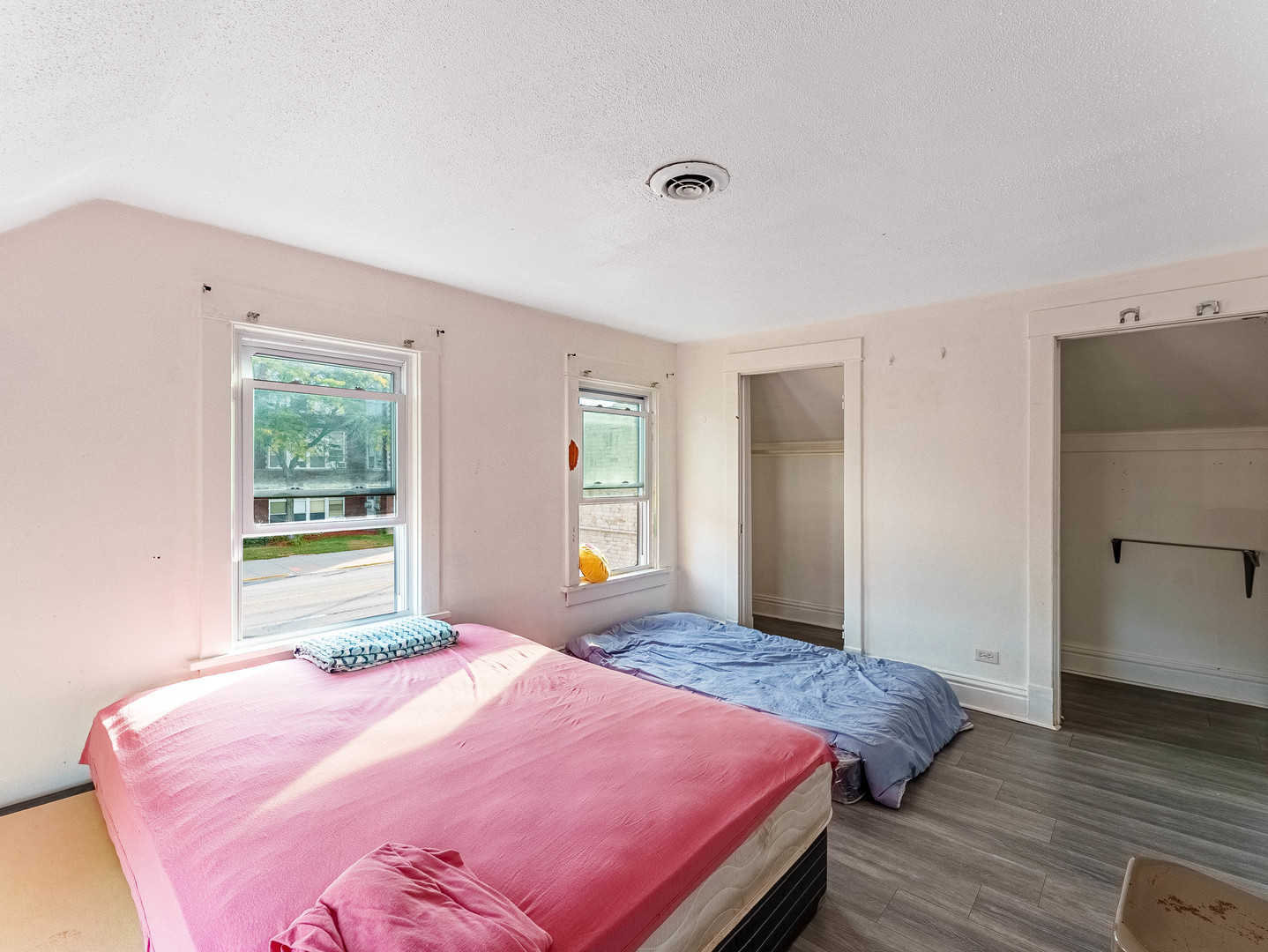 1014 Washington Street Waukegan, IL 60085 - Photo 14 of 18 a bedroom with a bed and wooden floor