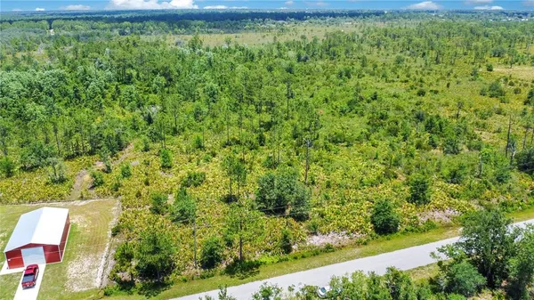 a view of an outdoor space and a yard