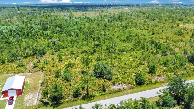 a view of an outdoor space and a yard