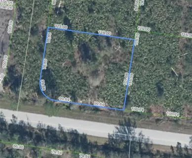 a view of a yard with an outdoor space