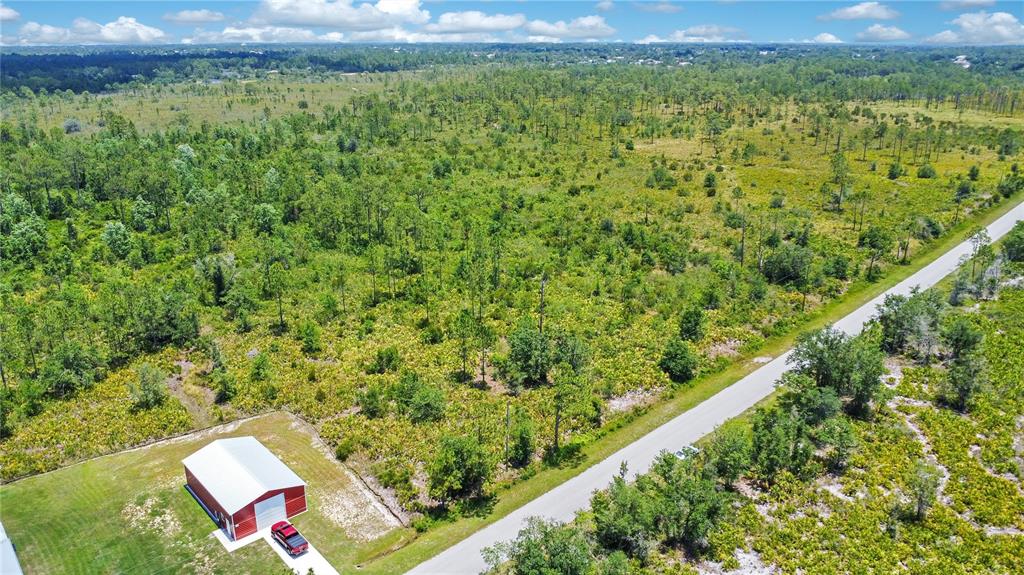4000 Gerona Avenue Sebring, FL 33872 - Photo 9 of 19 a view of a yard with an outdoor seating
