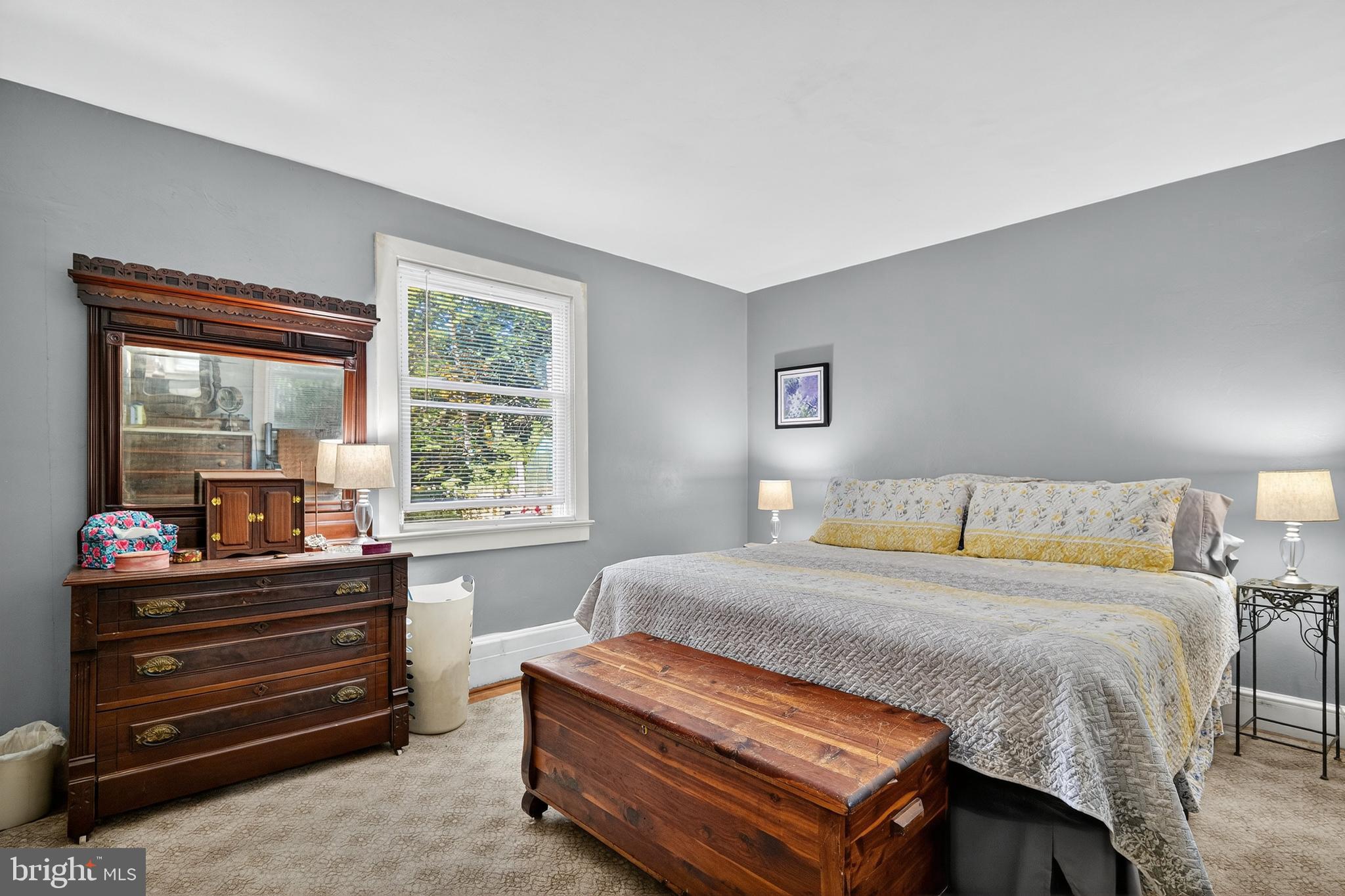 18 Monroe Drive Hamilton, NJ 08619 - Photo 17 of 37 a bedroom with a bed and a window