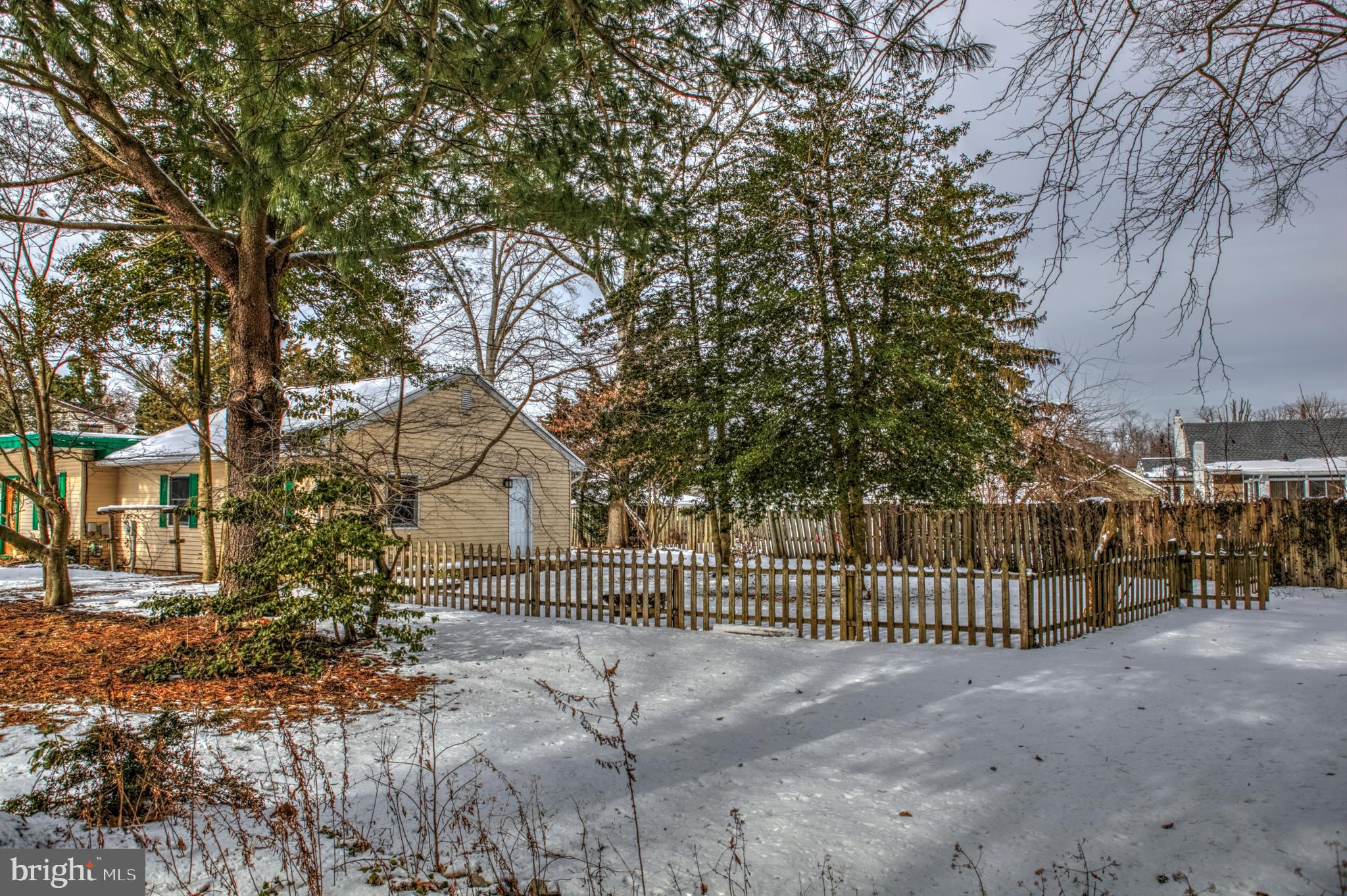18 Monroe Drive Hamilton, NJ 08619 - Photo 34 of 37 a view of a yard with wooden fence