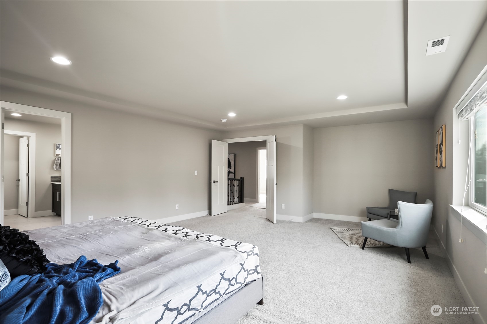 1224 198th Place Southeast Bothell, WA 98012 - Photo 18 of 38 a bedroom with furniture and a window