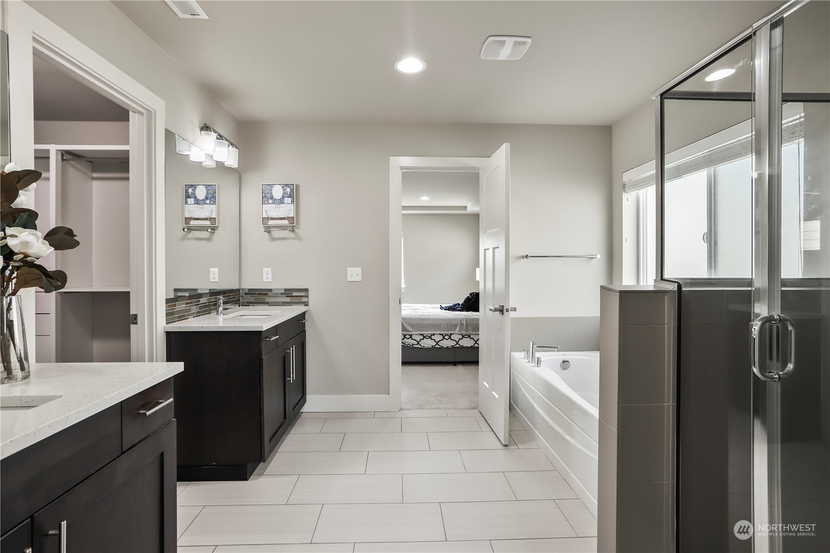 1224 198th Place Southeast Bothell, WA 98012 - Photo 20 of 38 a large bathroom with a double vanity sink a mirror and a shower
