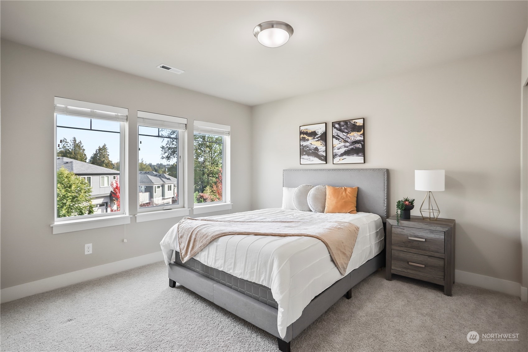 1224 198th Place Southeast Bothell, WA 98012 - Photo 22 of 38 a a spacious bedroom with a bed and a couch