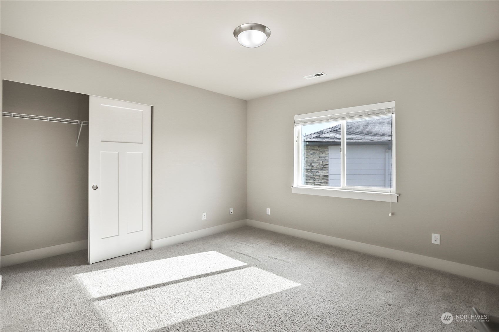 1224 198th Place Southeast Bothell, WA 98012 - Photo 24 of 38 an empty room with a window