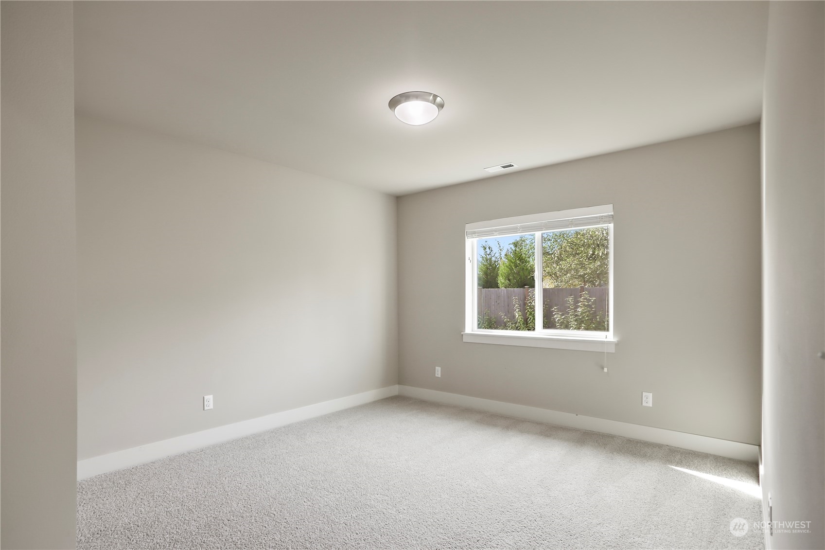 1224 198th Place Southeast Bothell, WA 98012 - Photo 25 of 38 an empty room with a window