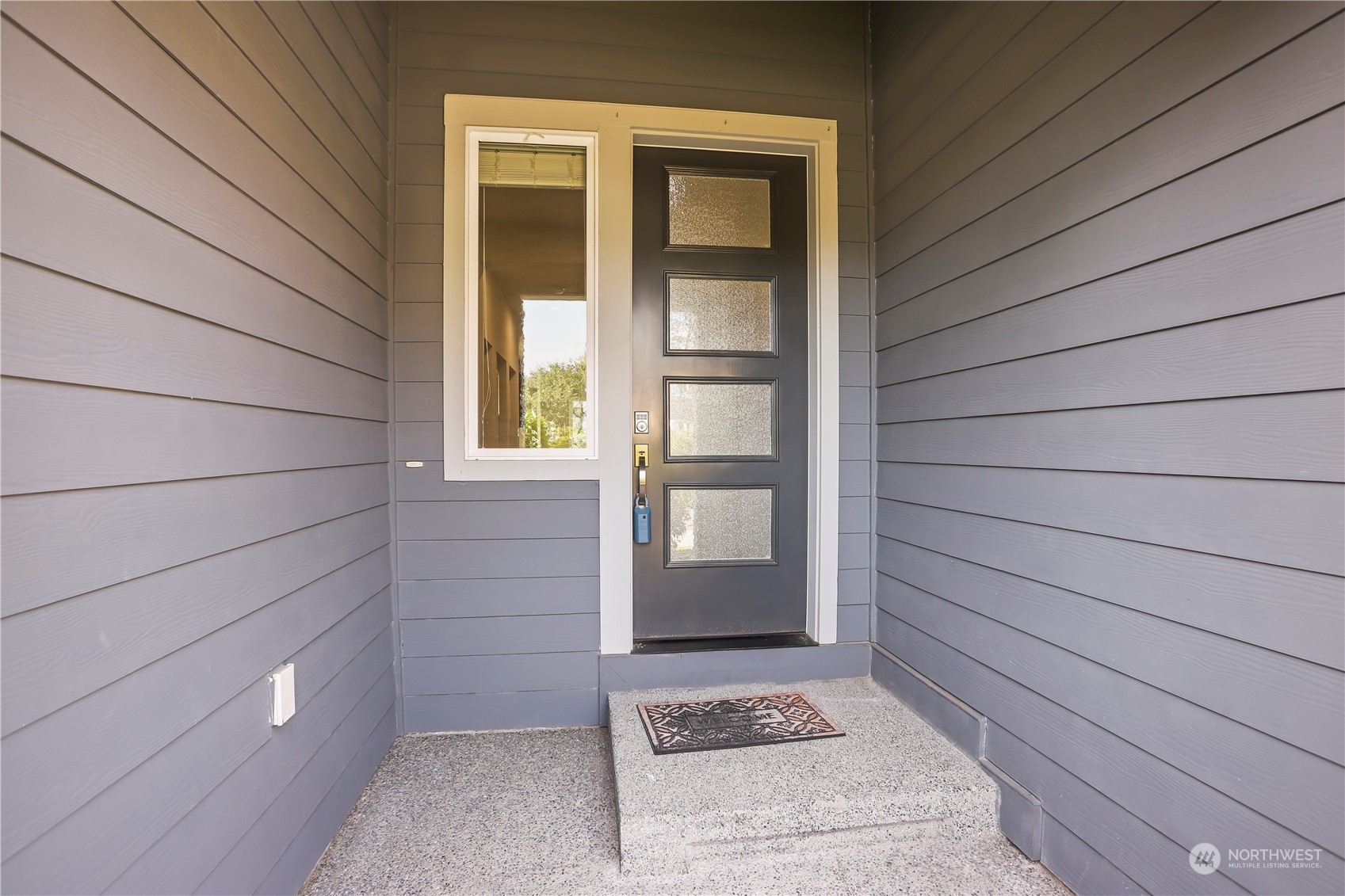 1224 198th Place Southeast Bothell, WA 98012 - Photo 3 of 38 a view of an entrance of the house