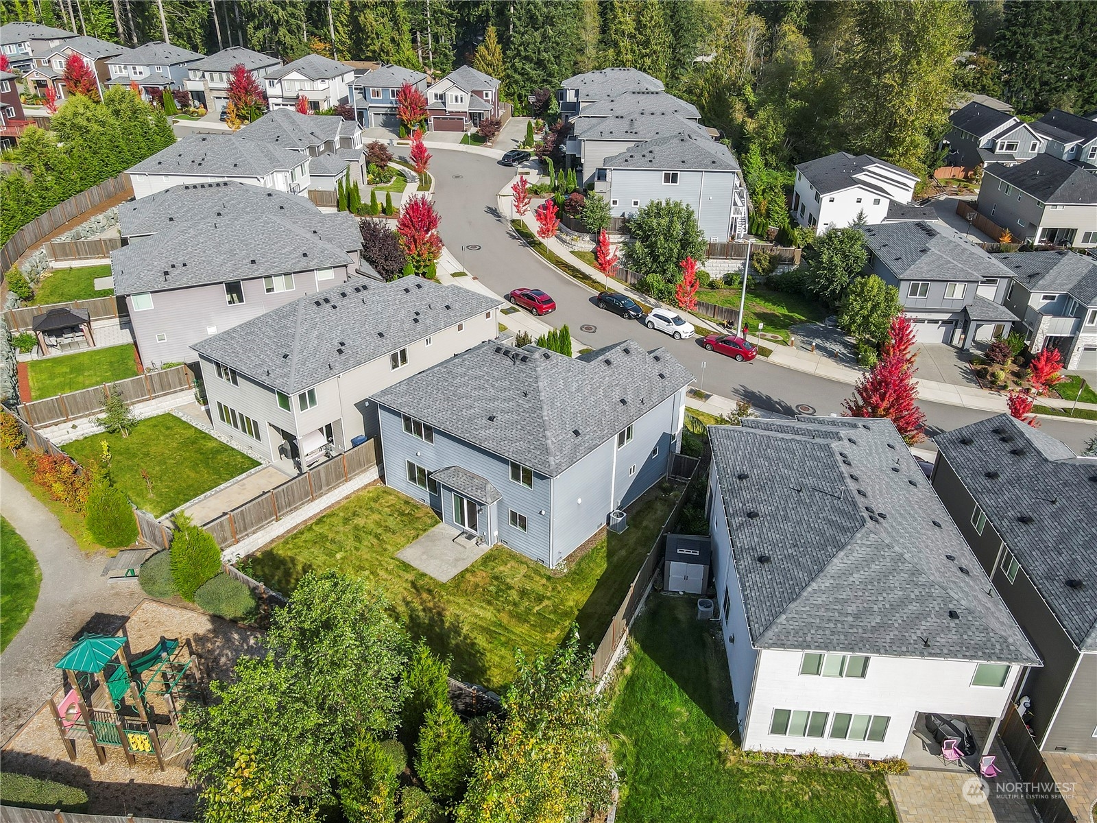 1224 198th Place Southeast Bothell, WA 98012 - Photo 32 of 38 an aerial view of residential houses with outdoor space and parking