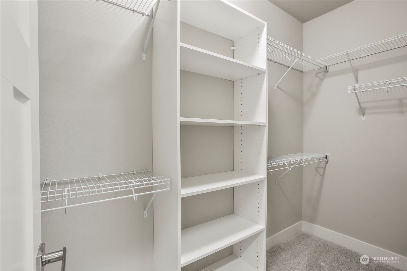 1224 198th Place Southeast Bothell, WA 98012 - Photo 7 of 38 a view of an empty walk in closet