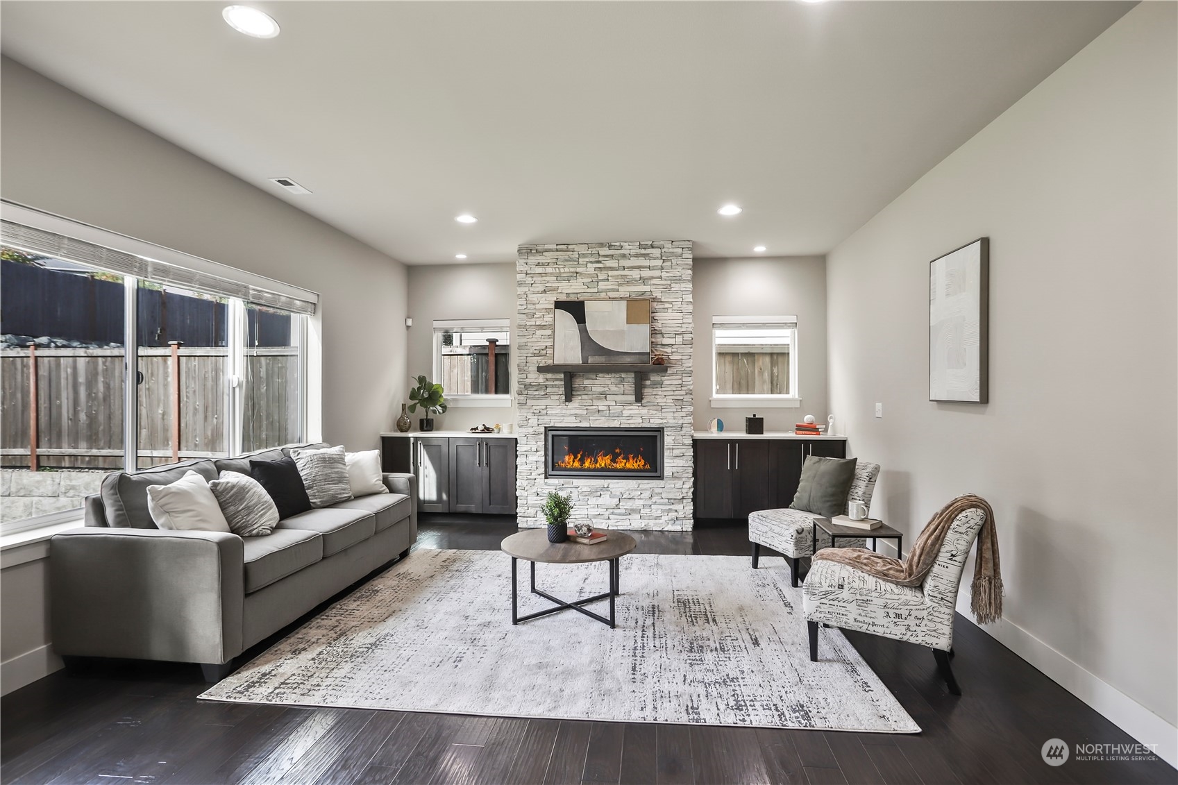 1224 198th Place Southeast Bothell, WA 98012 - Photo 8 of 38 a living room with furniture and a large window