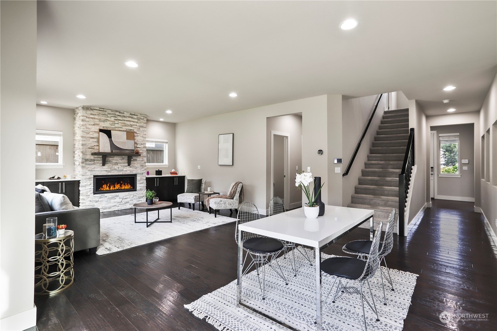 1224 198th Place Southeast Bothell, WA 98012 - Photo 10 of 38 a living room with furniture and wooden floor