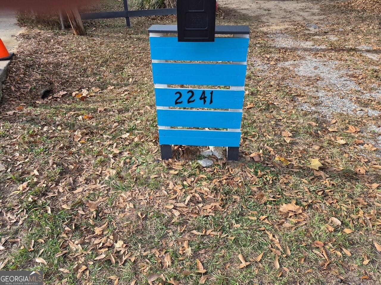 2241 Bruce Avenue Columbus, GA 31903 - Photo 3 of 15 a view of a bench in the backyard