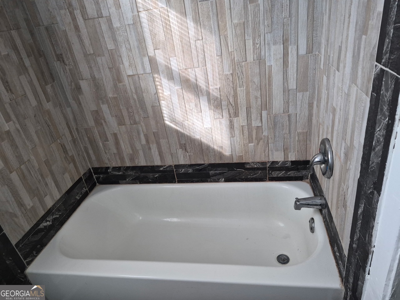 2241 Bruce Avenue Columbus, GA 31903 - Photo 7 of 15 a bathroom with a bathtub