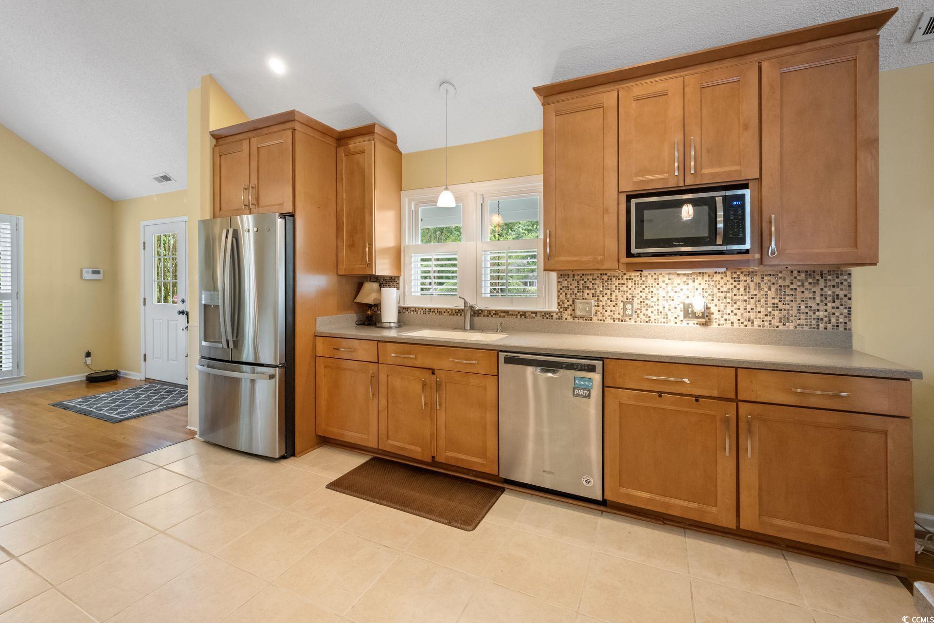33 Great Lakes Road Pawleys Island, SC 29585 - Photo 7 of 30 Kitchen featuring stainless steel appliances, sink