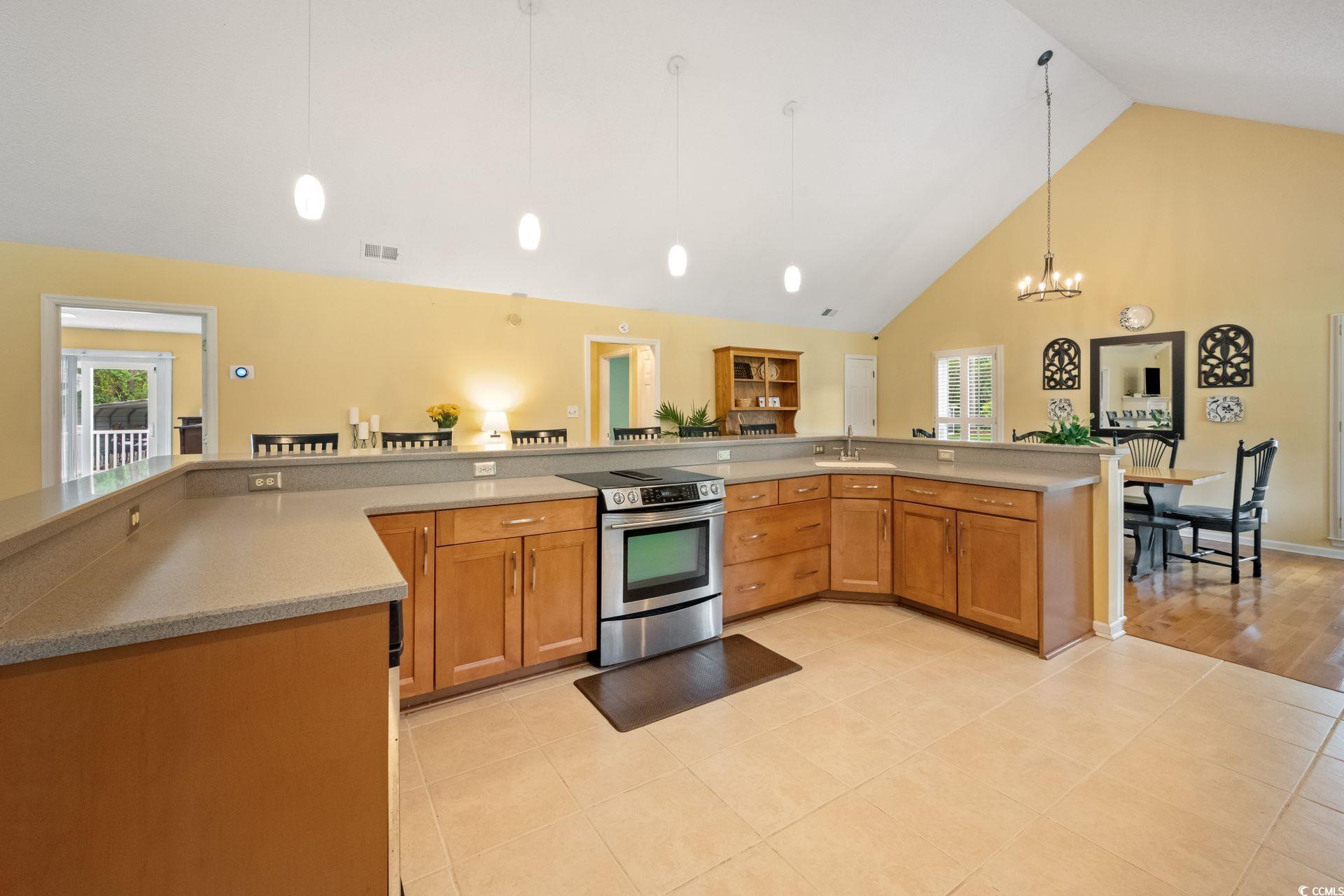 33 Great Lakes Road Pawleys Island, SC 29585 - Photo 8 of 30 Kitchen featuring light hardwood / wood-style floo