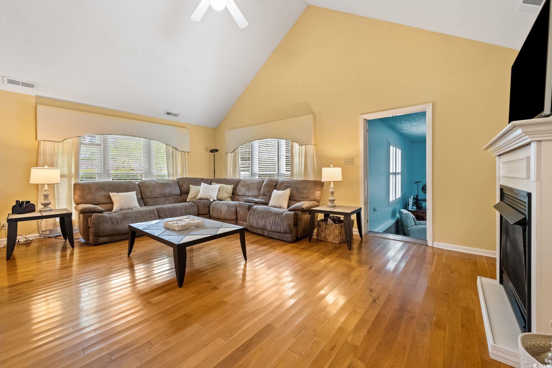 33 Great Lakes Road Pawleys Island, SC 29585 - Photo 9 of 30 Living room with light hardwood / wood-style floor