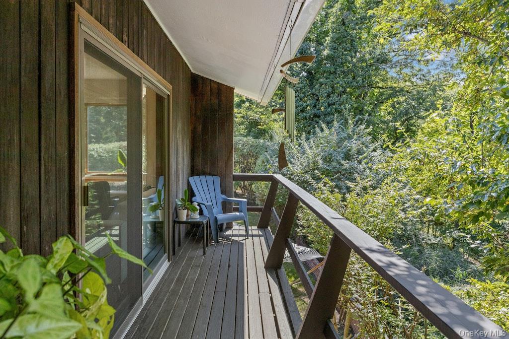 2 Buttermilk Falls Road Nyack, NY 10960 - Photo 17 of 41 a balcony with wooden floor and outdoor seating