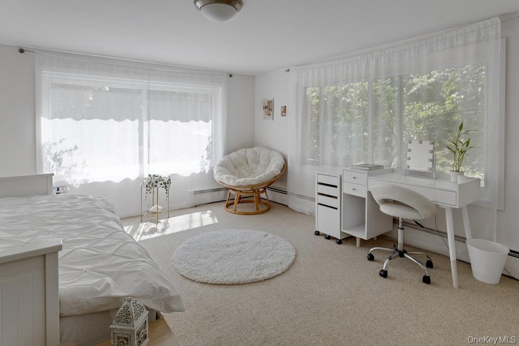 2 Buttermilk Falls Road Nyack, NY 10960 - Photo 23 of 41 a room with a large window and chair